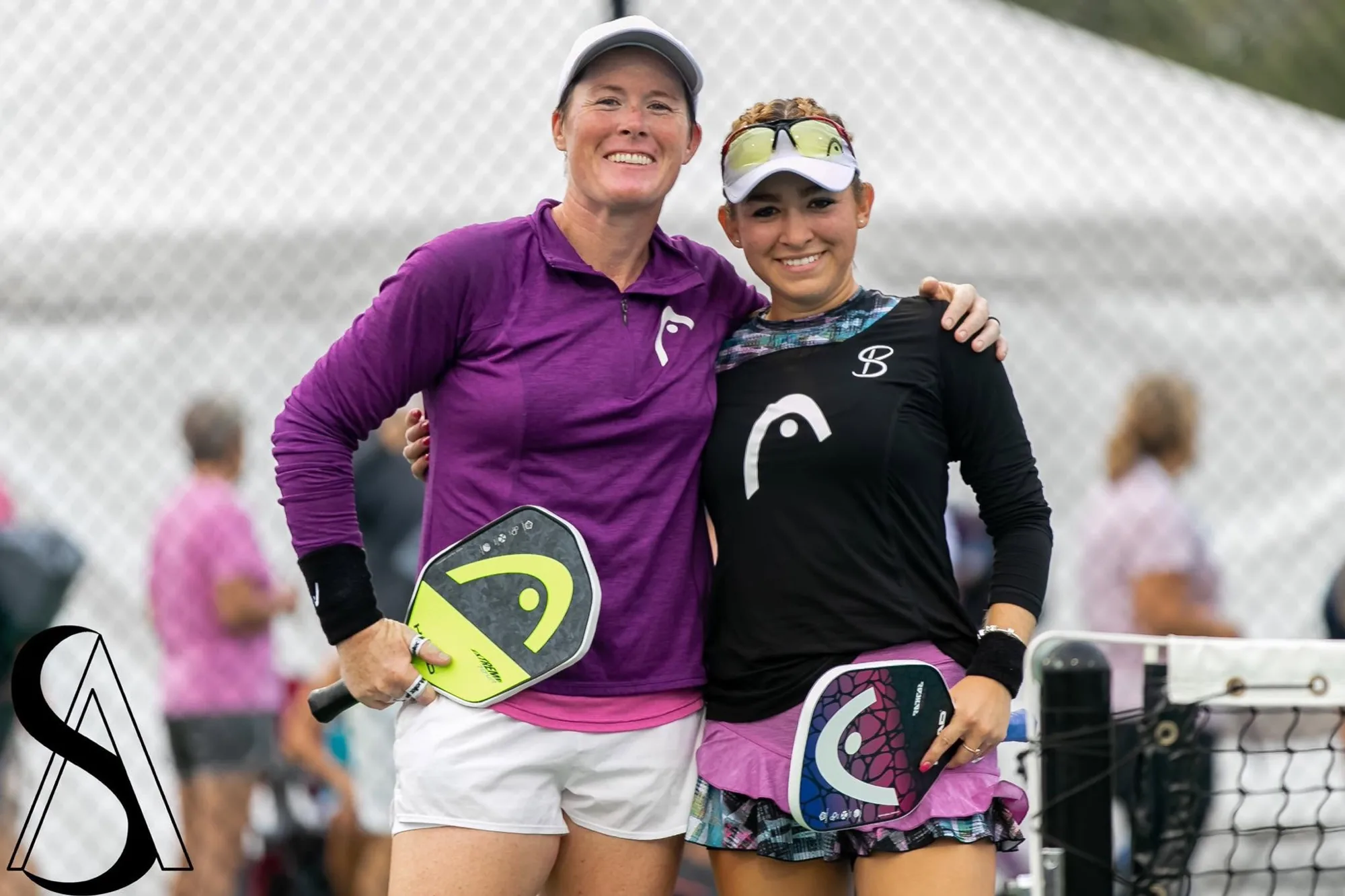 Sarah Ansboury with players at a clinic